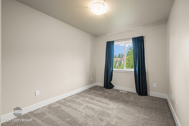 12248 Vista Ridge Loop # 30, Eagle River, AK 99577 - unfurnished room featuring carpet flooring and baseboards
