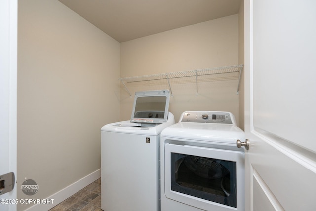 12248 Vista Ridge Loop # 30, Eagle River, AK 99577 - washroom featuring independent washer and dryer and baseboards