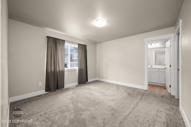 12248 Vista Ridge Loop # 30, Eagle River, AK 99577 - unfurnished bedroom with carpet flooring and connected bathroom