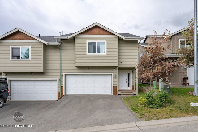 12248 Vista Ridge Loop # 30, Eagle River, AK 99577 - view of front facade with asphalt driveway and a garage