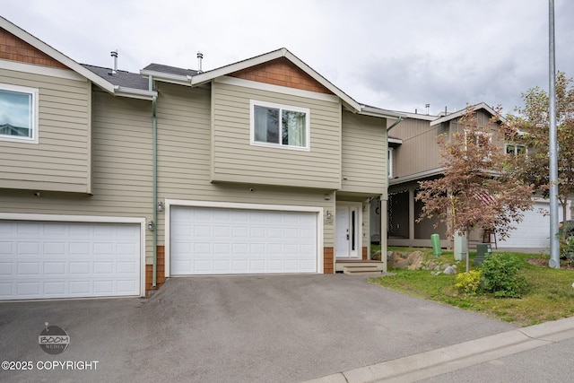 12248 Vista Ridge Loop # 30, Eagle River, AK 99577 - view of property with asphalt driveway and an attached garage