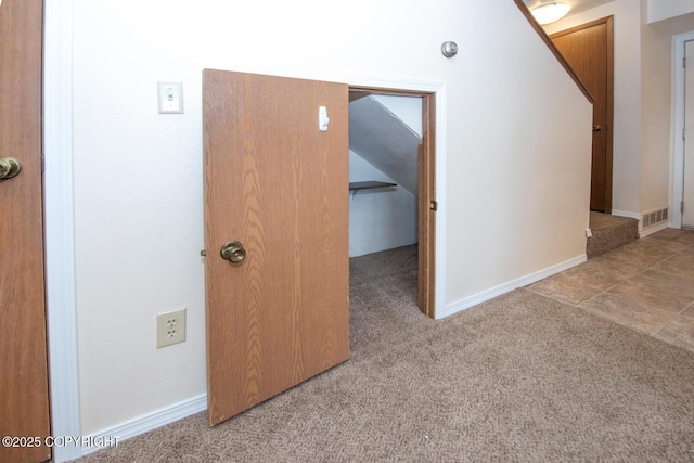 4063 E 20th Ave Unit D54, Anchorage, AK 99508 - hall with carpet floors and baseboards