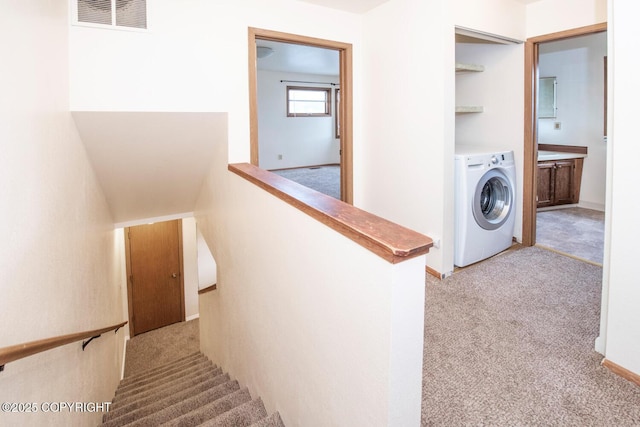 4063 E 20th Ave Unit D54, Anchorage, AK 99508 - stairs with washer / clothes dryer and carpet floors