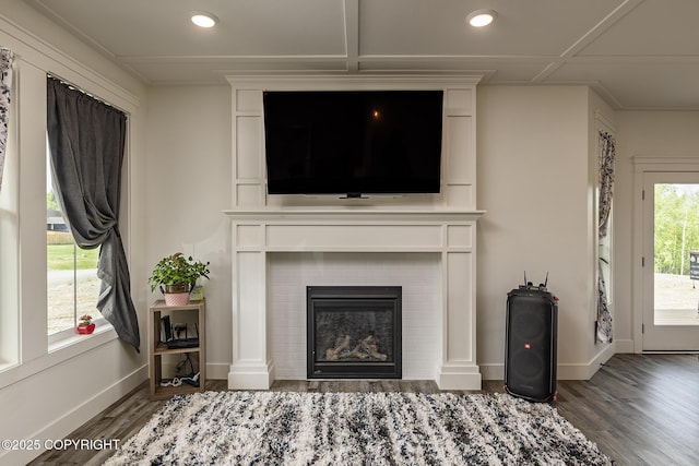 5233 W Jaxton Cir, Wasilla, AK 99623 - detailed view of wood finished floors, baseboards, recessed lighting, and a fireplace