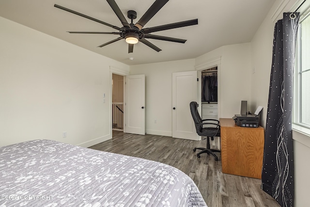 5233 W Jaxton Cir, Wasilla, AK 99623 - bedroom featuring wood finished floors, baseboards, a desk, and ceiling fan