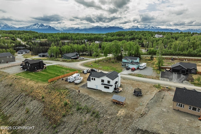 5233 W Jaxton Cir, Wasilla, AK 99623 - drone / aerial view of a forest and a mountainous background
