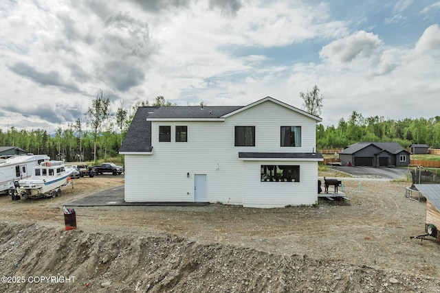 5233 W Jaxton Cir, Wasilla, AK 99623 - rear view of house featuring a shingled roof
