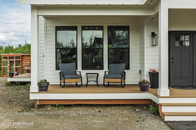 5233 W Jaxton Cir, Wasilla, AK 99623 - property entrance with a porch