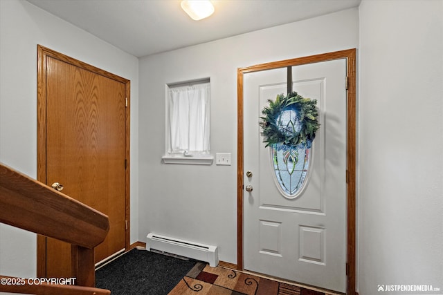 3529 W 41st Ave, Anchorage, AK 99517 - entryway featuring a baseboard radiator and baseboards