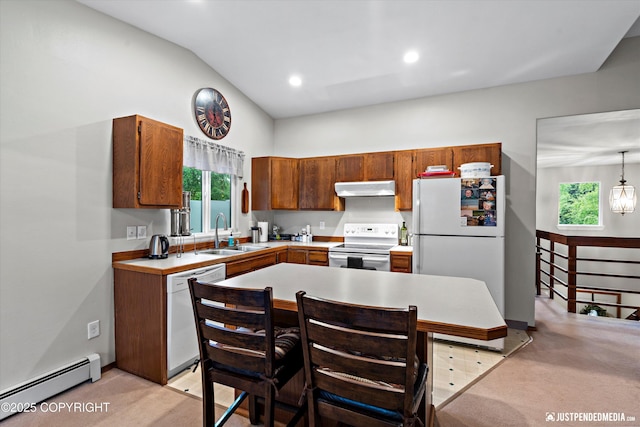 3529 W 41st Ave, Anchorage, AK 99517 - kitchen with white appliances, under cabinet range hood, a baseboard radiator, a sink, and light colored carpet