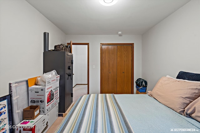 3529 W 41st Ave, Anchorage, AK 99517 - bedroom with light carpet and a closet