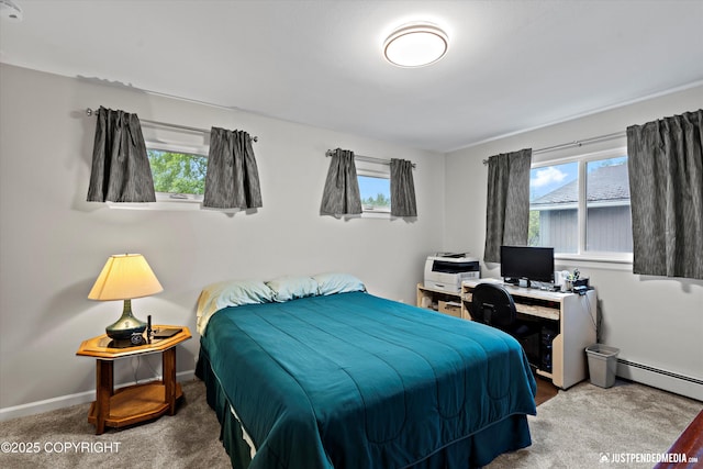 3529 W 41st Ave, Anchorage, AK 99517 - bedroom with multiple windows, an office area, a baseboard heating unit, and baseboards