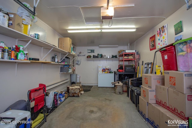 767 N Yakima St, Wasilla, AK 99654 - garage featuring fridge and a garage door opener