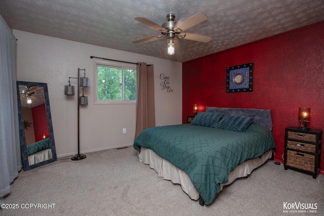 767 N Yakima St, Wasilla, AK 99654 - bedroom featuring carpet, a textured ceiling, and ceiling fan