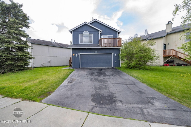 3933 Sycamore Loop, Anchorage, AK 99504 - traditional-style house with a balcony, a front lawn, driveway, and an attached garage