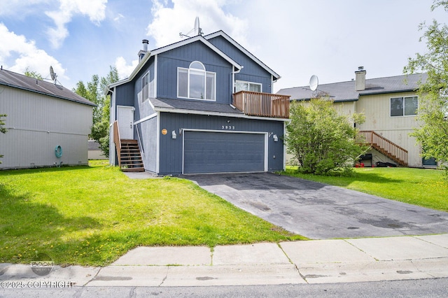 3933 Sycamore Loop, Anchorage, AK 99504 - view of front of home with stairs, a garage, a front lawn, and asphalt driveway