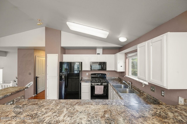3933 Sycamore Loop, Anchorage, AK 99504 - kitchen featuring black appliances, a sink, lofted ceiling, white cabinets, and stone counters
