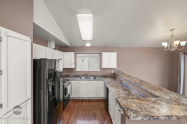 3933 Sycamore Loop, Anchorage, AK 99504 - kitchen featuring black appliances, a sink, a peninsula, a chandelier, and dark wood-style floors
