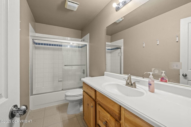 3933 Sycamore Loop, Anchorage, AK 99504 - full bath featuring vanity, toilet, and combined bath / shower with glass door