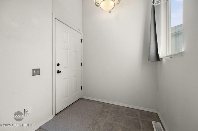 3933 Sycamore Loop, Anchorage, AK 99504 - foyer entrance featuring baseboards