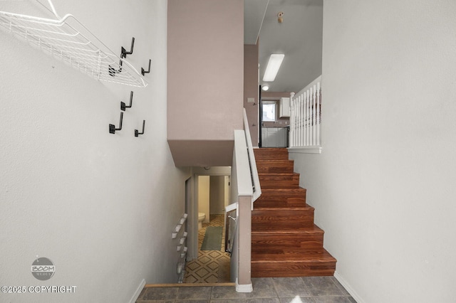 3933 Sycamore Loop, Anchorage, AK 99504 - staircase featuring baseboards