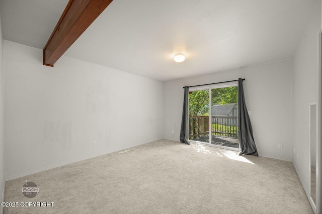 3933 Sycamore Loop, Anchorage, AK 99504 - carpeted empty room with beam ceiling