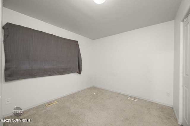 3933 Sycamore Loop, Anchorage, AK 99504 - carpeted spare room featuring baseboards