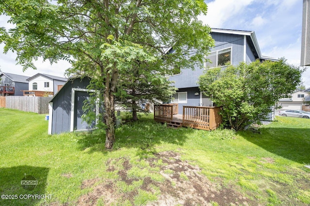 3933 Sycamore Loop, Anchorage, AK 99504 - view of yard featuring a wooden deck