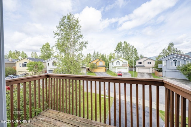 3933 Sycamore Loop, Anchorage, AK 99504 - wooden deck with a residential view