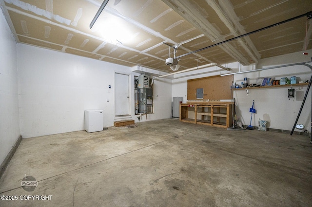 3933 Sycamore Loop, Anchorage, AK 99504 - garage featuring a garage door opener and electric panel