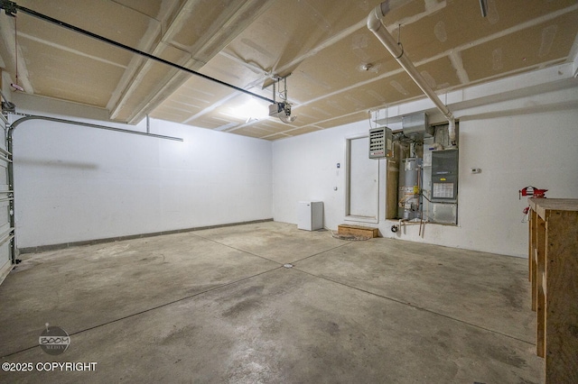 3933 Sycamore Loop, Anchorage, AK 99504 - garage featuring water heater, a garage door opener, and heating unit