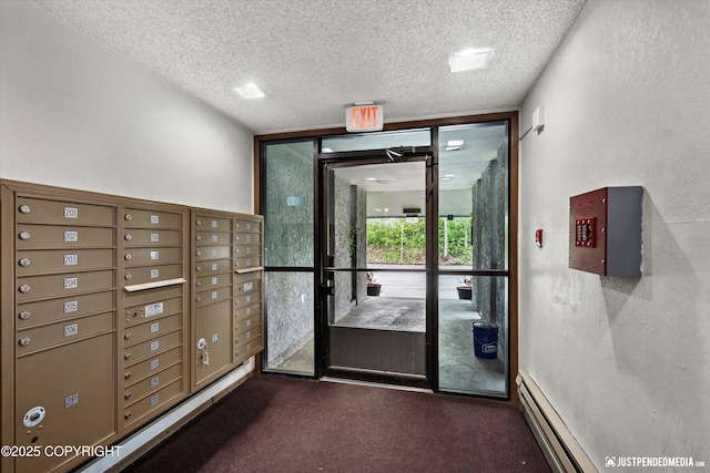4433 San Ernesto Ave # 104, Anchorage, AK 99508 - surrounding community with a textured ceiling, floor to ceiling windows, and mail area