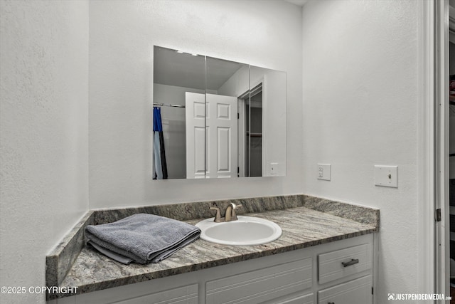 4433 San Ernesto Ave # 104, Anchorage, AK 99508 - full bath with vanity and a textured wall