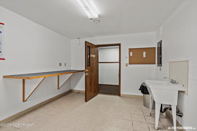 4433 San Ernesto Ave # 104, Anchorage, AK 99508 - washroom with baseboards