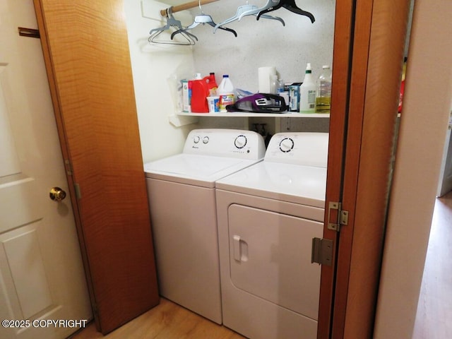 4259 Shirley Ct, Homer, AK 99603 - laundry room with independent washer and dryer and light wood finished floors