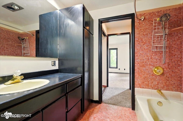 4821 S Outrigger Dr, Wasilla, AK 99654 - bathroom with vanity and washtub / shower combination
