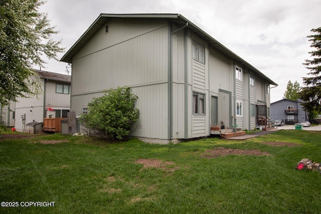 1701 Russian Jack Dr # D3, Anchorage, AK 99508 - view of home's exterior featuring a yard