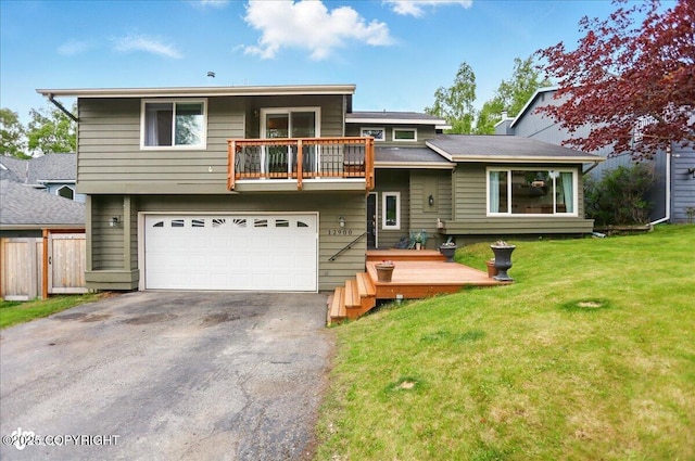 12900 Wellsford Cir, Anchorage, AK 99516 - view of front of home with a balcony, driveway, an attached garage, and a wooden deck