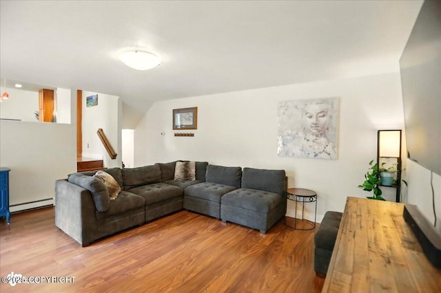 12900 Wellsford Cir, Anchorage, AK 99516 - living area with baseboard heating and wood finished floors
