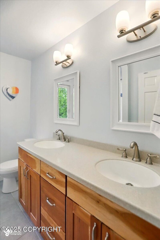 12900 Wellsford Cir, Anchorage, AK 99516 - bathroom featuring double vanity, toilet, and tile patterned flooring