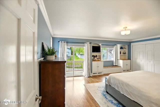 12900 Wellsford Cir, Anchorage, AK 99516 - bedroom featuring crown molding, access to outside, and wood finished floors