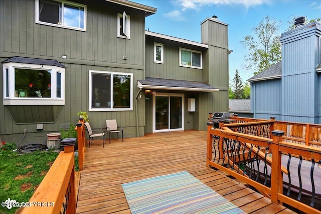 12900 Wellsford Cir, Anchorage, AK 99516 - wooden terrace featuring a grill