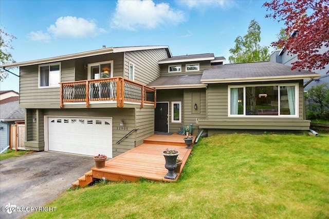 12900 Wellsford Cir, Anchorage, AK 99516 - rear view of house featuring a balcony, asphalt driveway, a lawn, and a garage