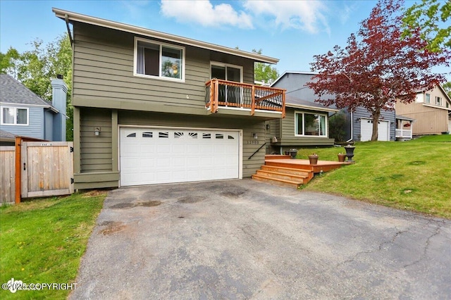 12900 Wellsford Cir, Anchorage, AK 99516 - view of front of home with a balcony, driveway, and a garage