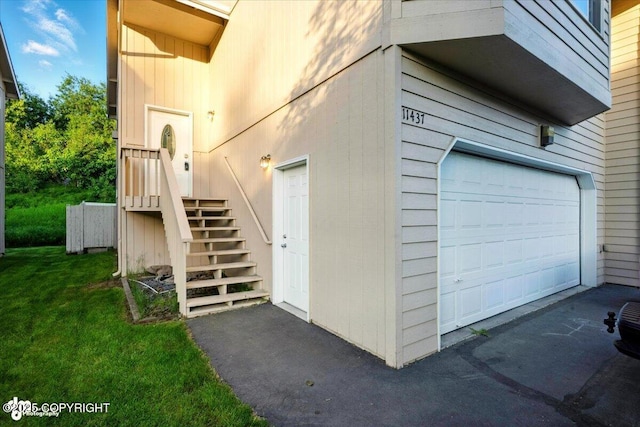 11437 Spyglass Hill Cir, Anchorage, AK 99515 - doorway to property with a yard