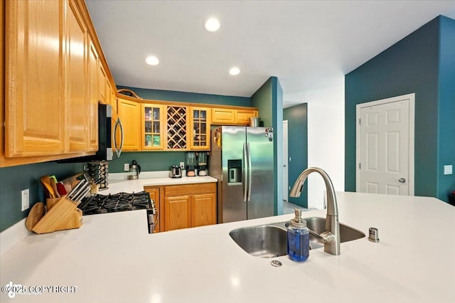 11437 Spyglass Hill Cir, Anchorage, AK 99515 - kitchen with appliances with stainless steel finishes, light countertops, glass insert cabinets, and recessed lighting