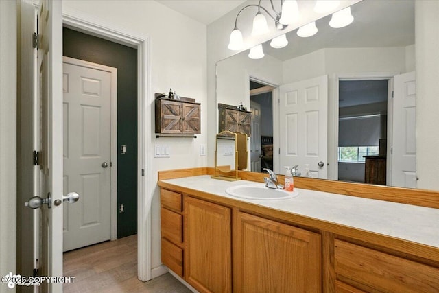 11437 Spyglass Hill Cir, Anchorage, AK 99515 - bathroom with vanity and wood finished floors