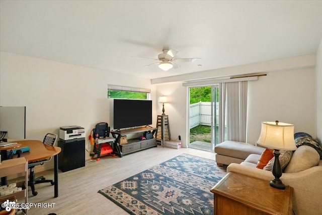 11437 Spyglass Hill Cir, Anchorage, AK 99515 - living area with a ceiling fan, wood finished floors, and an office area