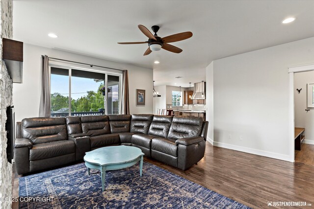 1506 M St, Anchorage, AK 99501 - living room with ceiling fan, wood finished floors, healthy amount of natural light, recessed lighting, and a stone fireplace