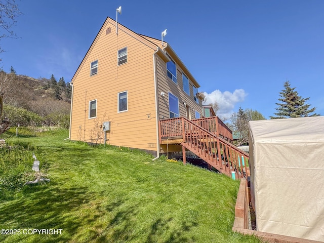 124 Mountain View Dr, Homer, AK 99603 - rear view of property featuring a deck, stairs, and a yard